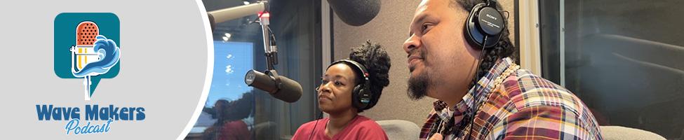 image of two people with microphones