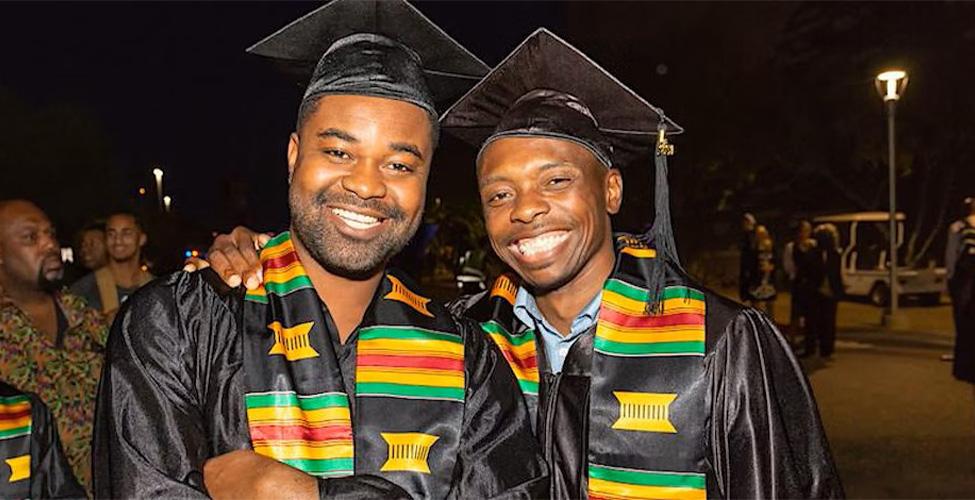 two African American students at graduation