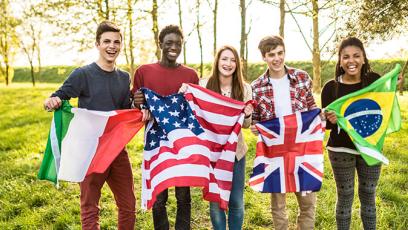 Multicultural group of students with world flags