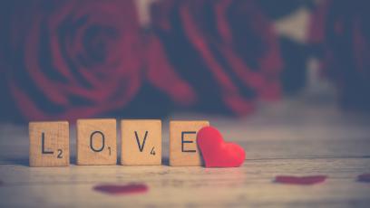 Wooden blocks spelling "LOVE"
