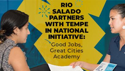 Two women sharing information at an expo booth. Text: Rio Salado Partners With Tempe in National Initiative: Good Jobs, Great Cities Academy