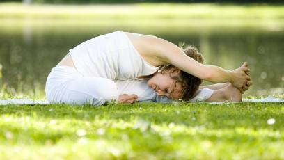 Woman doing yoga outdoors