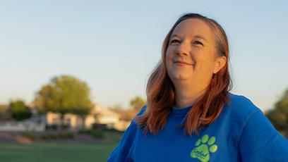 headshot of Tara Lopez smiling into the sky