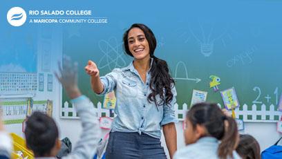 stock photo of a woman teaching in a classroom