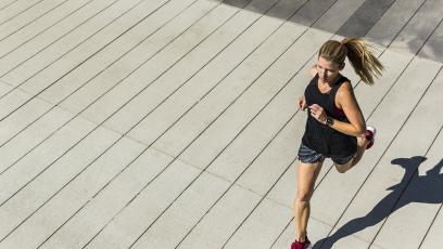 A woman running outdoors