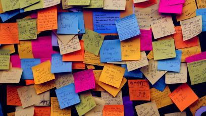 A wall of multi-colored post-it notes