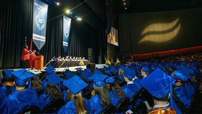 image of the crowd at commencement with camera facing the stage