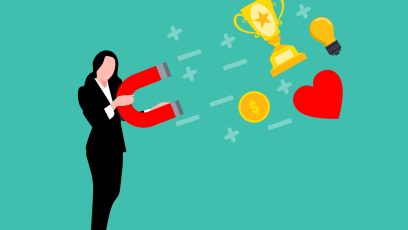 A woman with a big magnet drawing trophies, hearts, and coins toward her