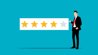 Man standing next to a four star rating