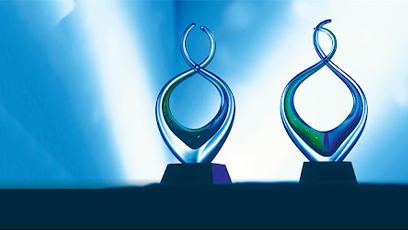 2025 ACE/Fidelity Investments Award for Institutional Transformation trophies.