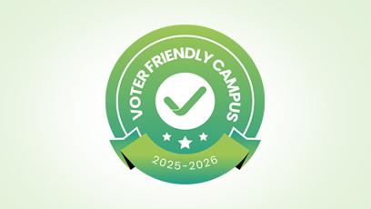 Green and white badge with a checkmark in the center, surrounded by the words "Voter Friendly Campus." Below the checkmark are three stars, and a ribbon at the bottom displays the years "2025–2026." The design has a circular, layered look with a gradient background.