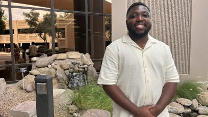 Tempe Rio Salado Student Ruben Joseph in front of building