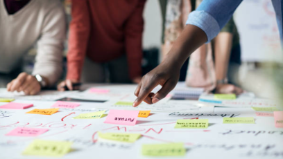 A group of people making a map with post-it notes