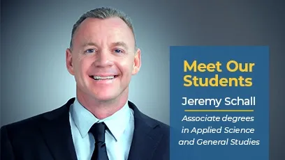 A smiling man in a suit and tie is featured against a gradient blue background. A graphic box on the right reads: Meet Our Students in bold yellow text, followed by Jeremy Schall and Associate degrees in Applied Science and General Studies in white text.