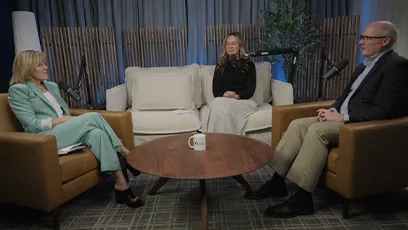 From left to right, President Kate Smith, Lindsey Crosland, and Jared Taylor are seated in armchairs around a small round table during a podcast-style conversation in a studio setting with soft lighting and plants in the background.