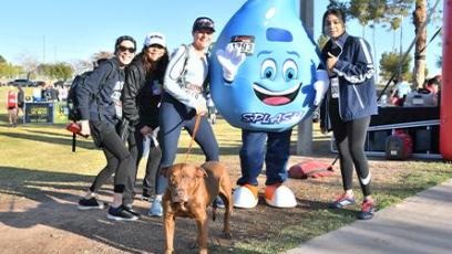 President Kate Smith, Rio mascot SPLASH, and runners at fun run