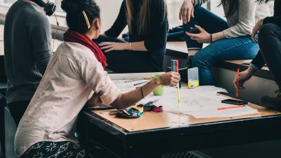 People sitting around table networking