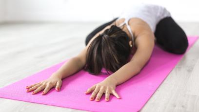 Woman doing yoga stretches