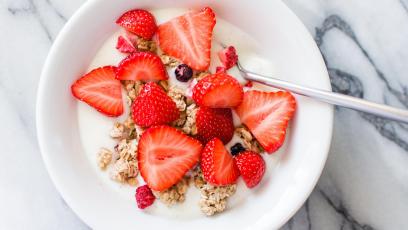 Bowl of yogurt and strawberries
