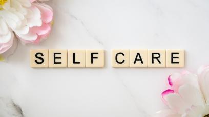 Word tiles that spell out Self Care