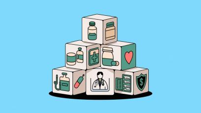 A pyramid stack of blocks with images of healthcare and hearts and dollar signs printed on their sides