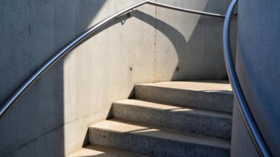 Curved staircase with handrail