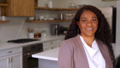 Jae Dillard standing in a kitchen