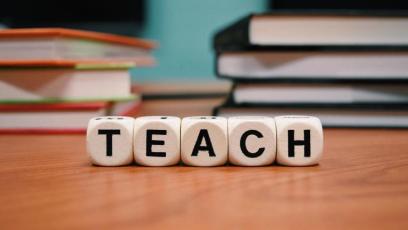 A set of blocks spelling out the word TEACH