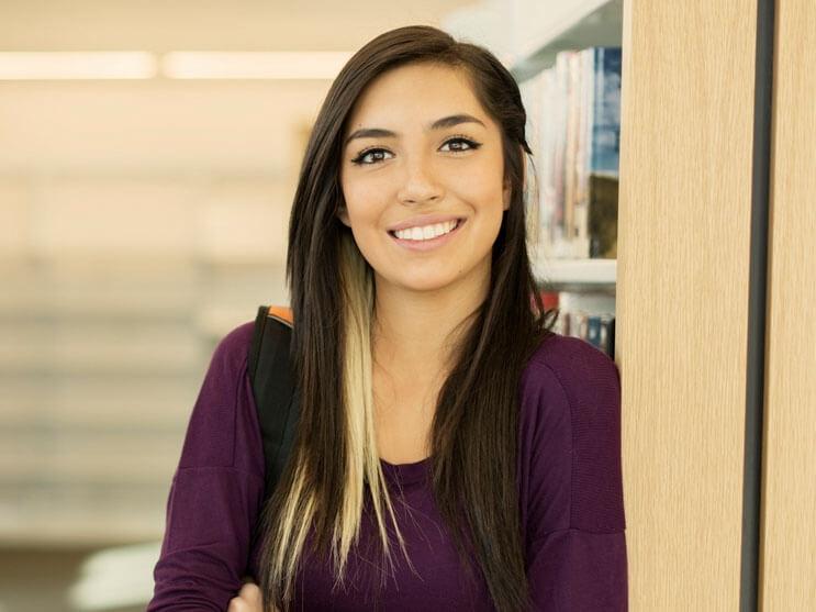 Student with books in background