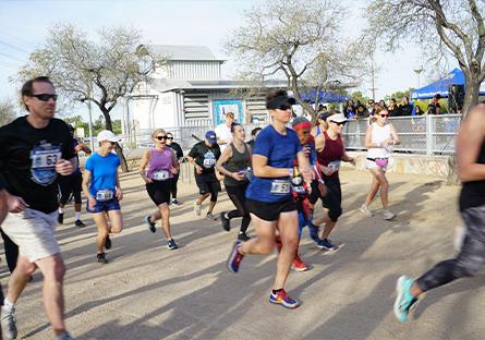 participants running the 2022 race along the canal