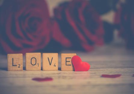Wooden blocks spelling "LOVE"