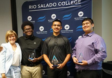 President Kate Smith with Bryaan Avila Arellano, Damio Garcia, AJ Pacheco