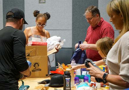 volunteers organizing boxes