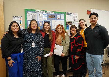 Employees posing for a group photo