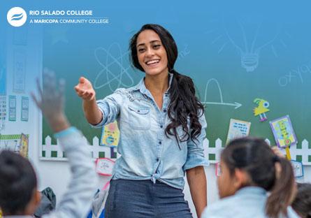 stock photo of a woman teaching in a classroom