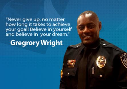 Officer Gregory Wright smiling next to his quote: "Never give up, no matter how long it takes to achieve your goal! Believe in y