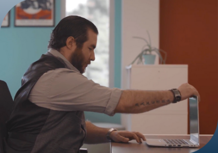A Veterans Approach To Interviewing Using The S.T.A.R. Method. Man looking at a laptop screen