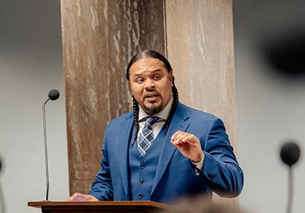 Cordero Holmes speaking at an event