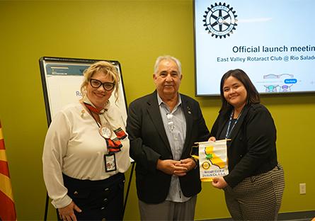 Kamal Della gifting a Rotary club flag