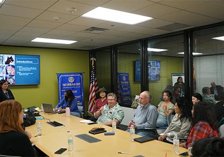 attendees watching to a presentation