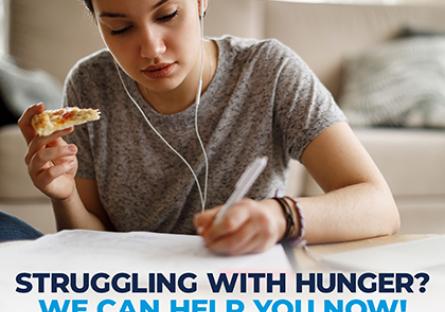 Young woman studying with a slice of pizza in hand. Text: Struggling with Hunger. We can help you now. Full Cart logo.