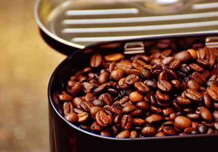 An open can of coffee beans