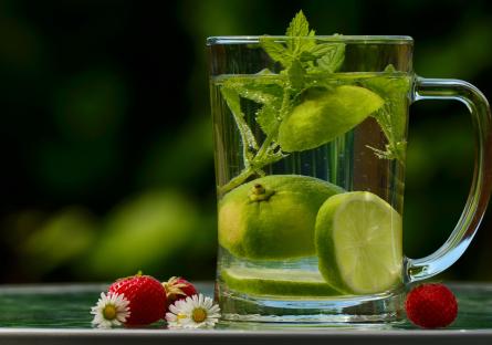 Glass with limes in it