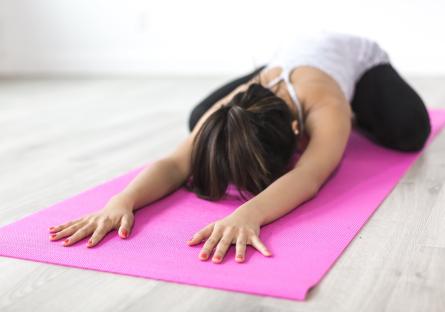 Woman doing yoga stretches
