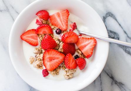Bowl of yogurt and strawberries