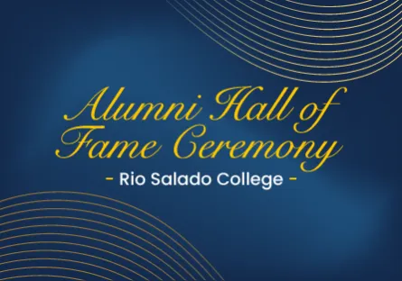 Graphic for the Rio Salado College Alumni Hall of Fame Ceremony featuring gold text on a dark blue background with decorative gold wave lines.