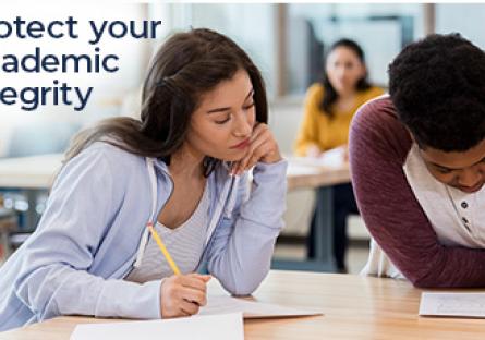 Student looking over the shoulder of another student during a test