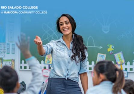 stock photo of a woman teaching in a classroom