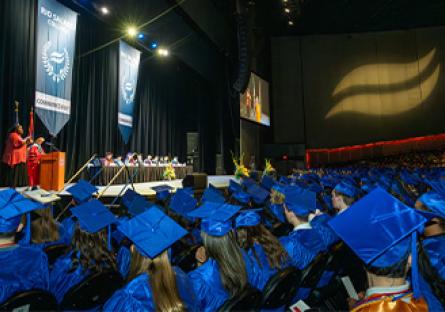 image of the crowd at commencement with camera facing the stage