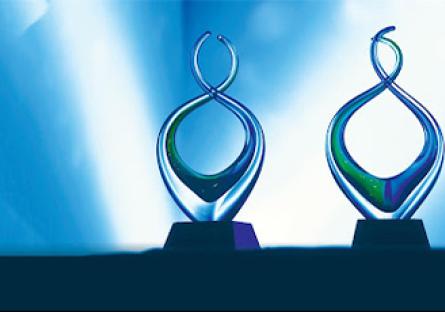 2025 ACE/Fidelity Investments Award for Institutional Transformation trophies.